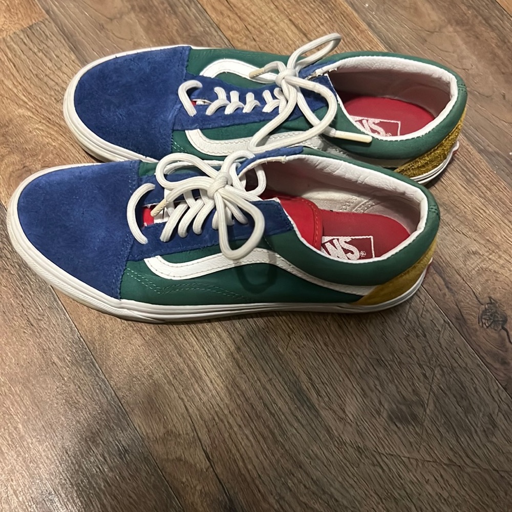 Green, Blue, Yellow, and Red Vans